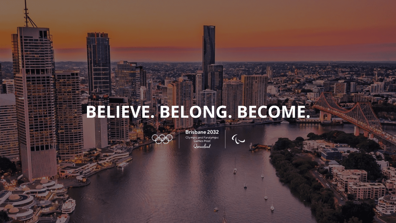 En la foto de fondo: la ciudad de Brisbane, al frente su slogan: believe, belong, become.